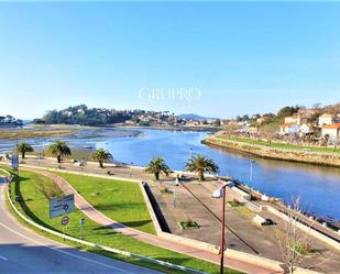 Exterior view of Duplex for sale in Baiona  with Heating, Terrace and Storage room