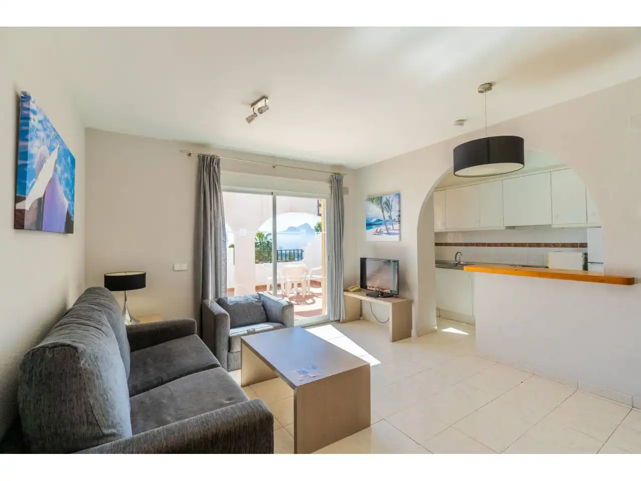 Wohnzimmer von Einfamilien-Reihenhaus zum Verkauf in Calpe / Calp mit Klimaanlage, Terrasse und Möbliert