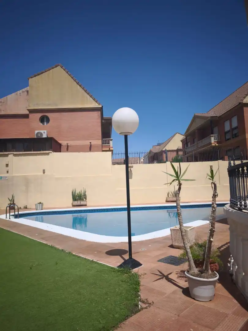 Piscina de Casa adosada en venta en Melilla con Aire acondicionado, Jardín privado y Terraza