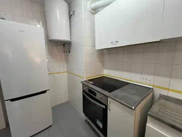 Cuina de Pis de lloguer en Puertollano amb Aire condicionat, Calefacció i Moblat