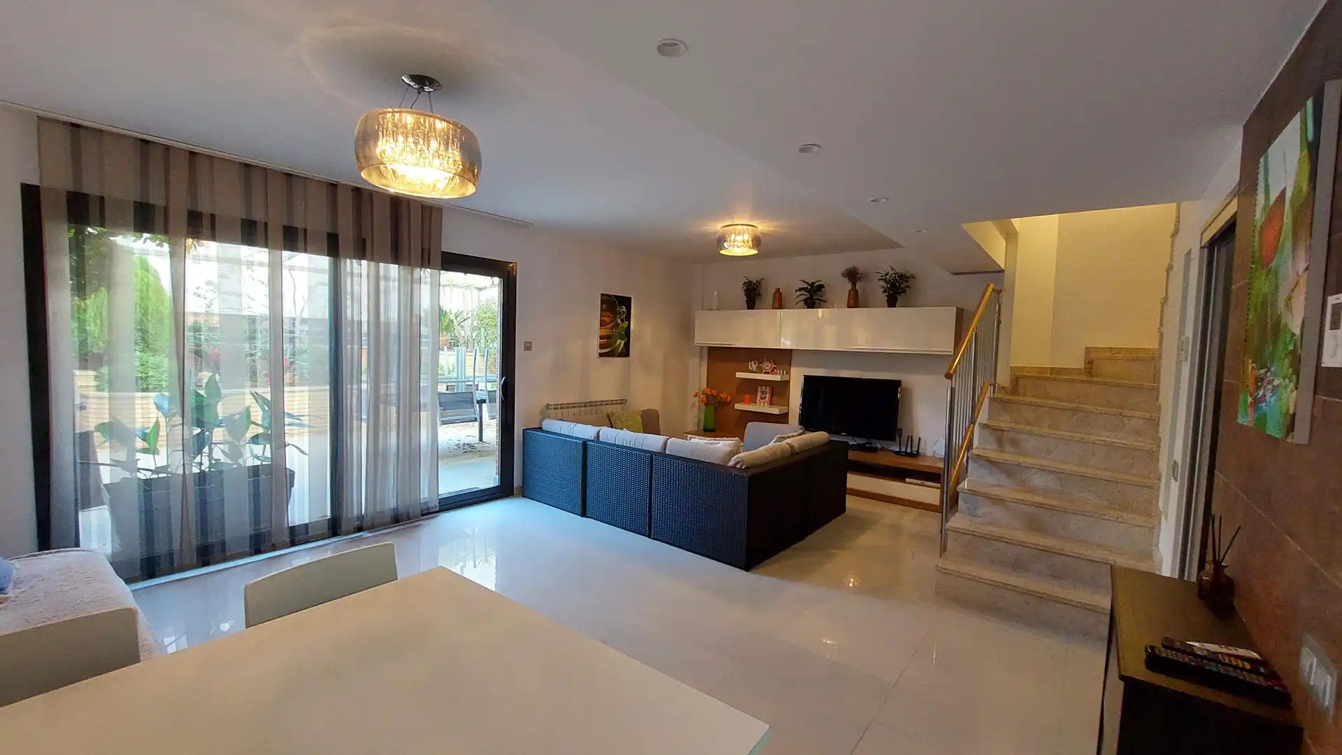 Sala de estar de Casa adosada en venta en Salou con Aire acondicionado, Calefacción y Jardín privado