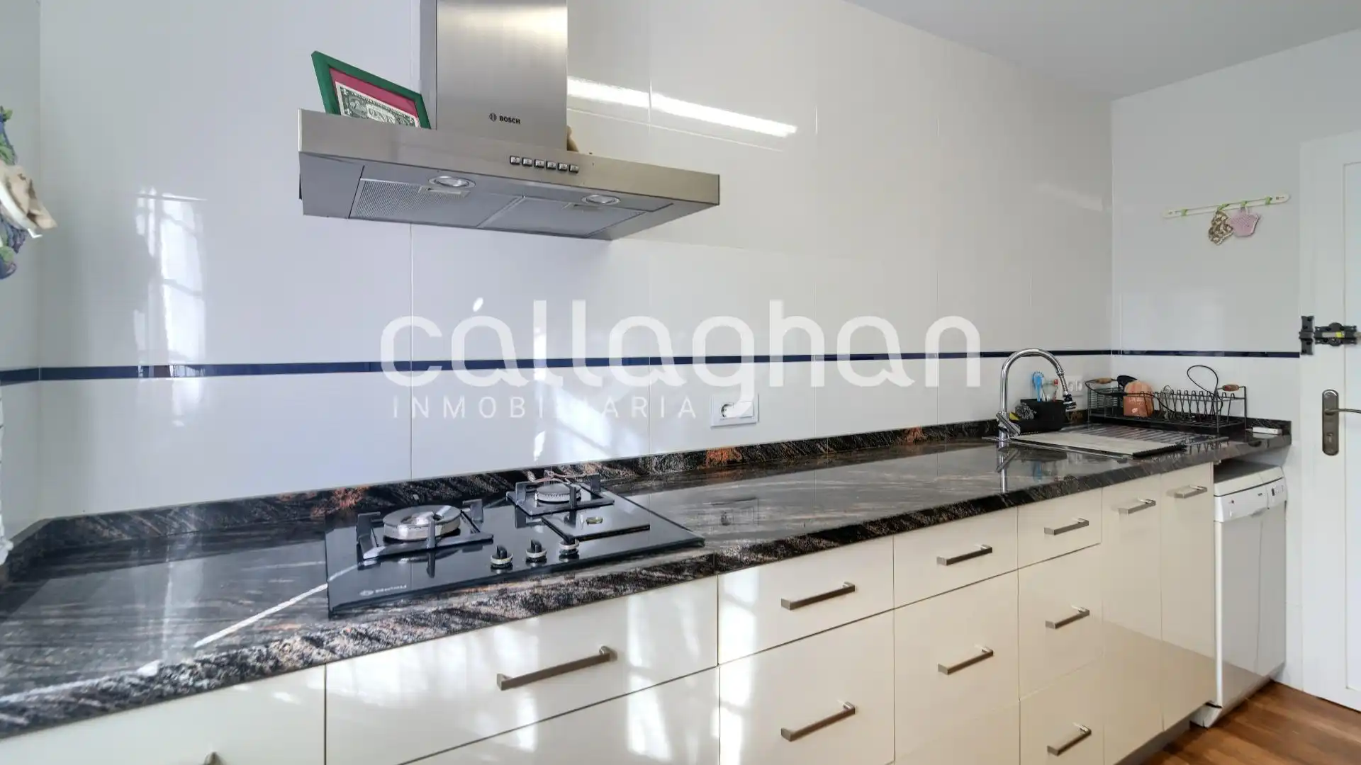 Cuina de Casa adosada en venda en Sagunto / Sagunt amb Aire condicionat, Calefacció i Terrassa