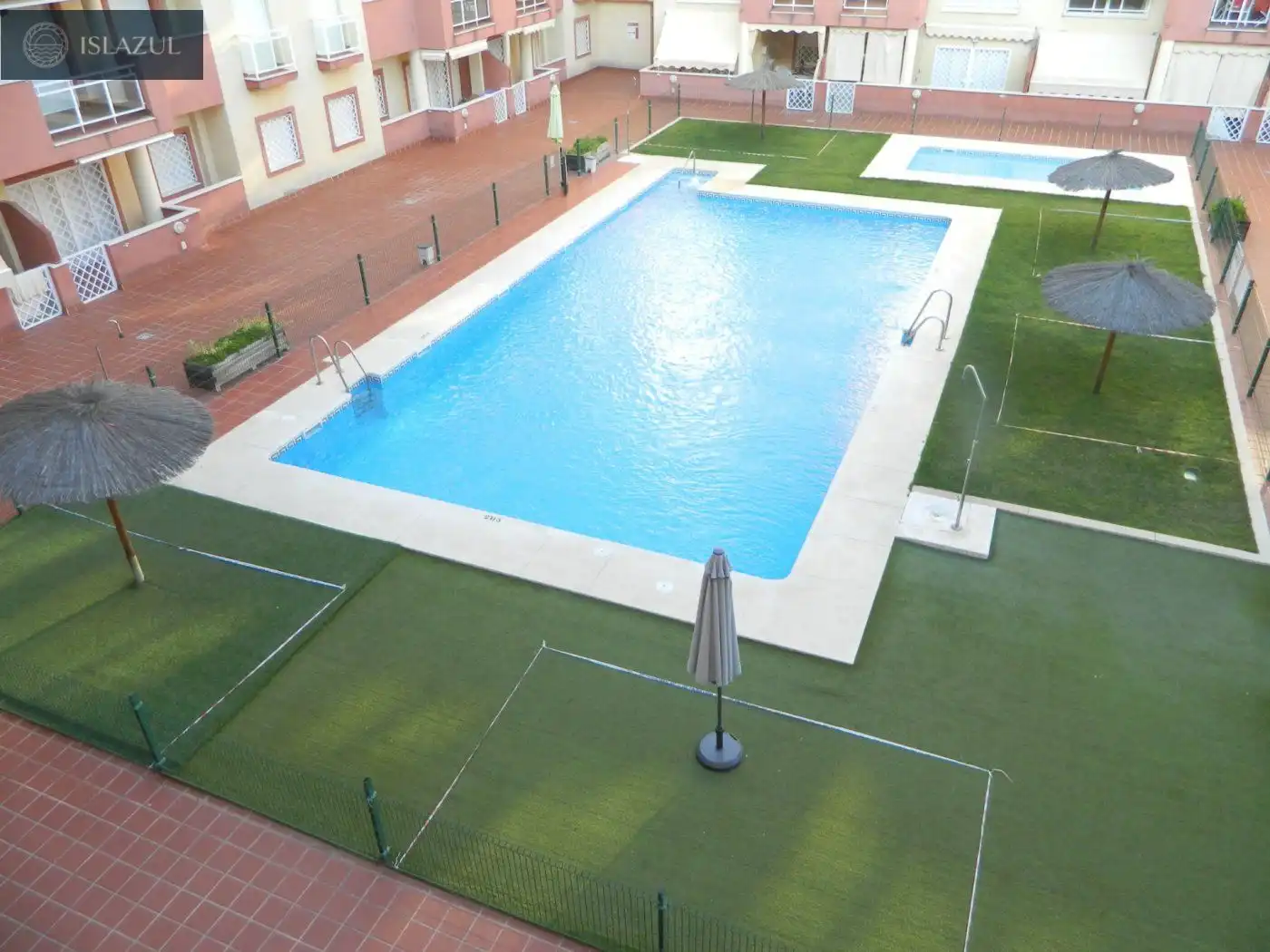 Piscina de Dúplex de alquiler en Isla Cristina con Terraza, Balcón y Piscina comunitaria