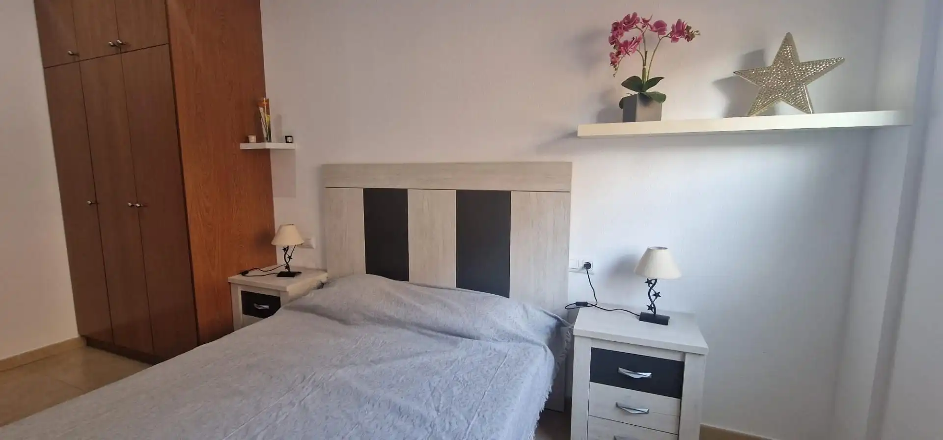 Schlafzimmer von Wohnung zur Miete in Águilas mit Klimaanlage, Privatgarten und Möbliert