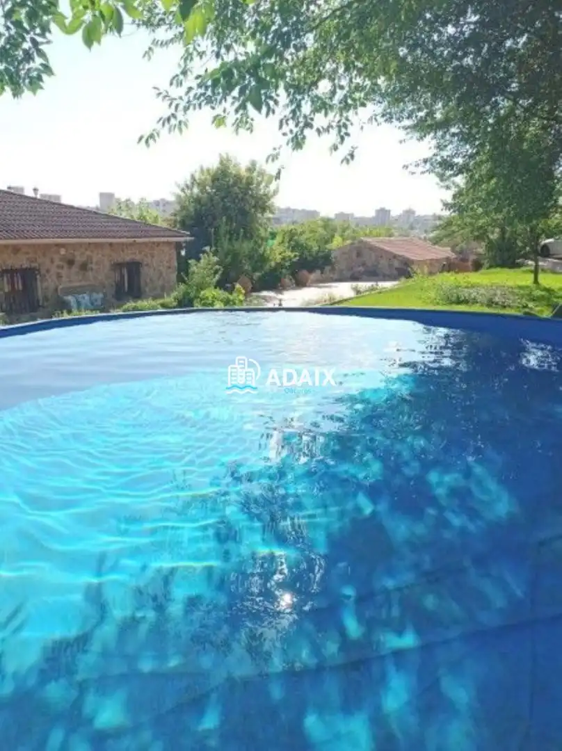 Schwimmbecken von Einfamilien-Reihenhaus zum Verkauf in Cáceres mit Klimaanlage und Terrasse