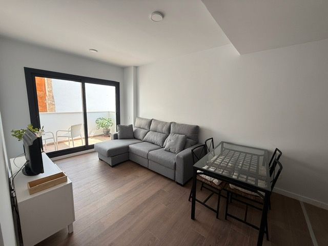 Sala de estar de Piso de alquiler en  Huelva Capital con Aire acondicionado, Calefacción y Parquet