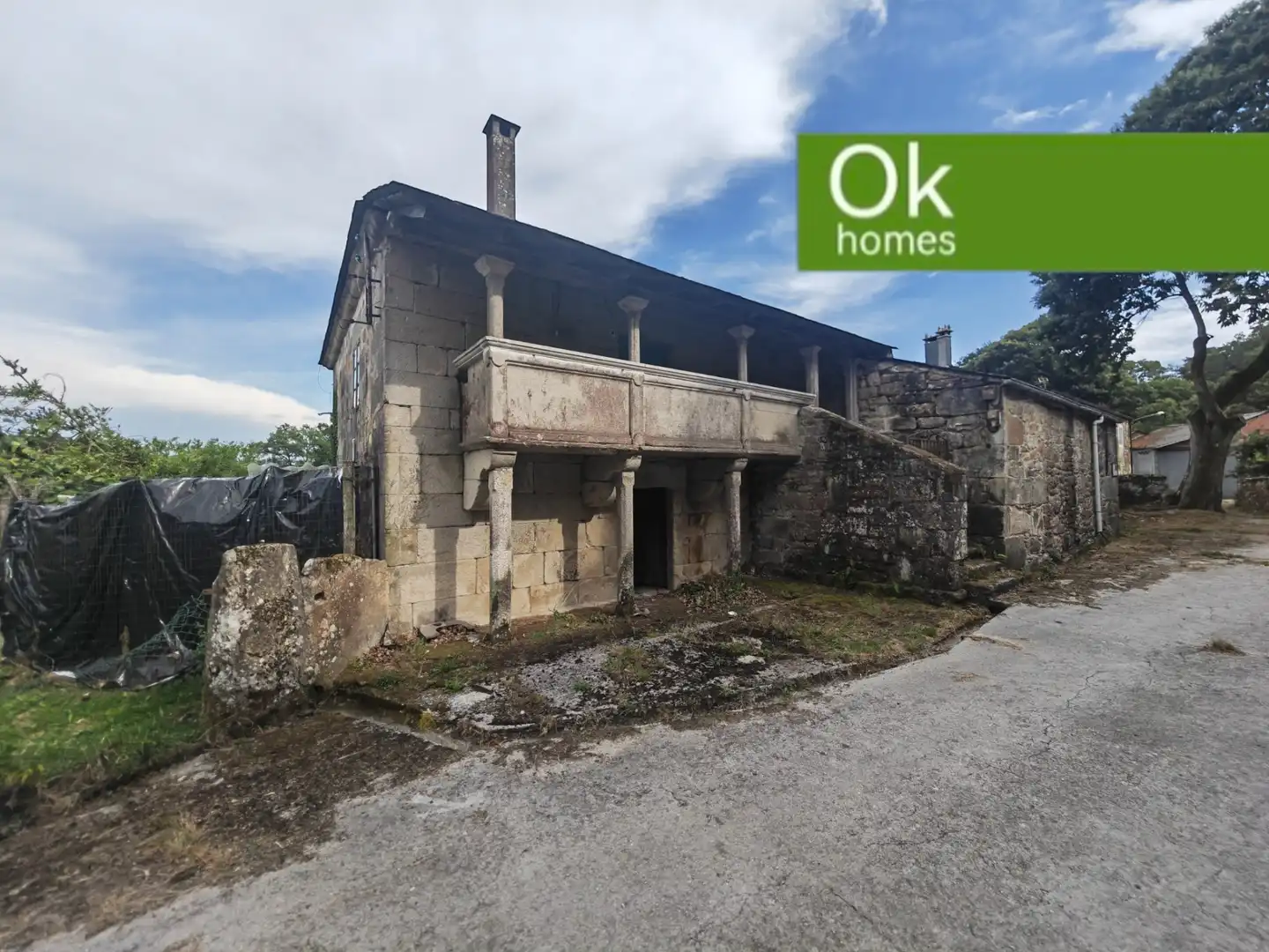 Exterior view of Detached homes for sale in Friol  with Storage room and Balcony