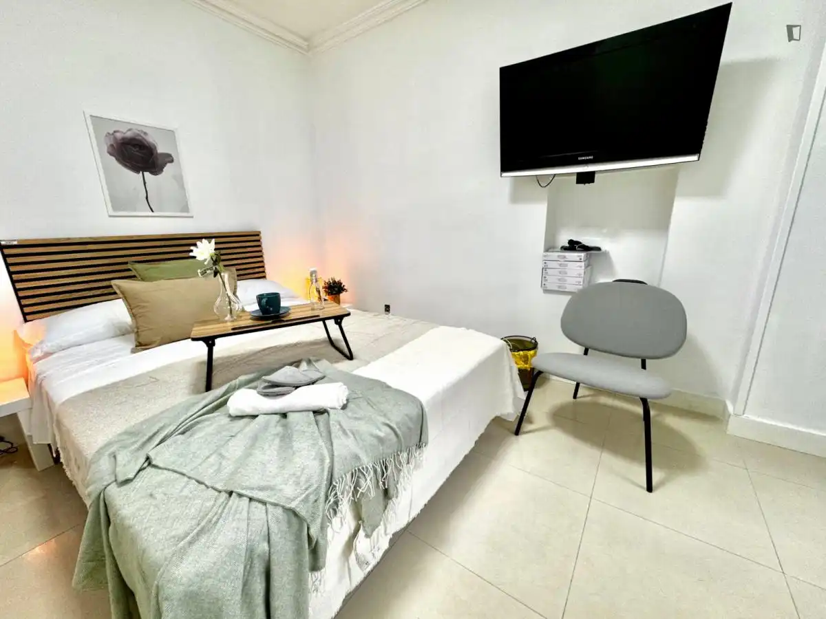 Sala de estar de Casa o chalet para compartir en  Madrid Capital con Aire acondicionado, Calefacción y Amueblado
