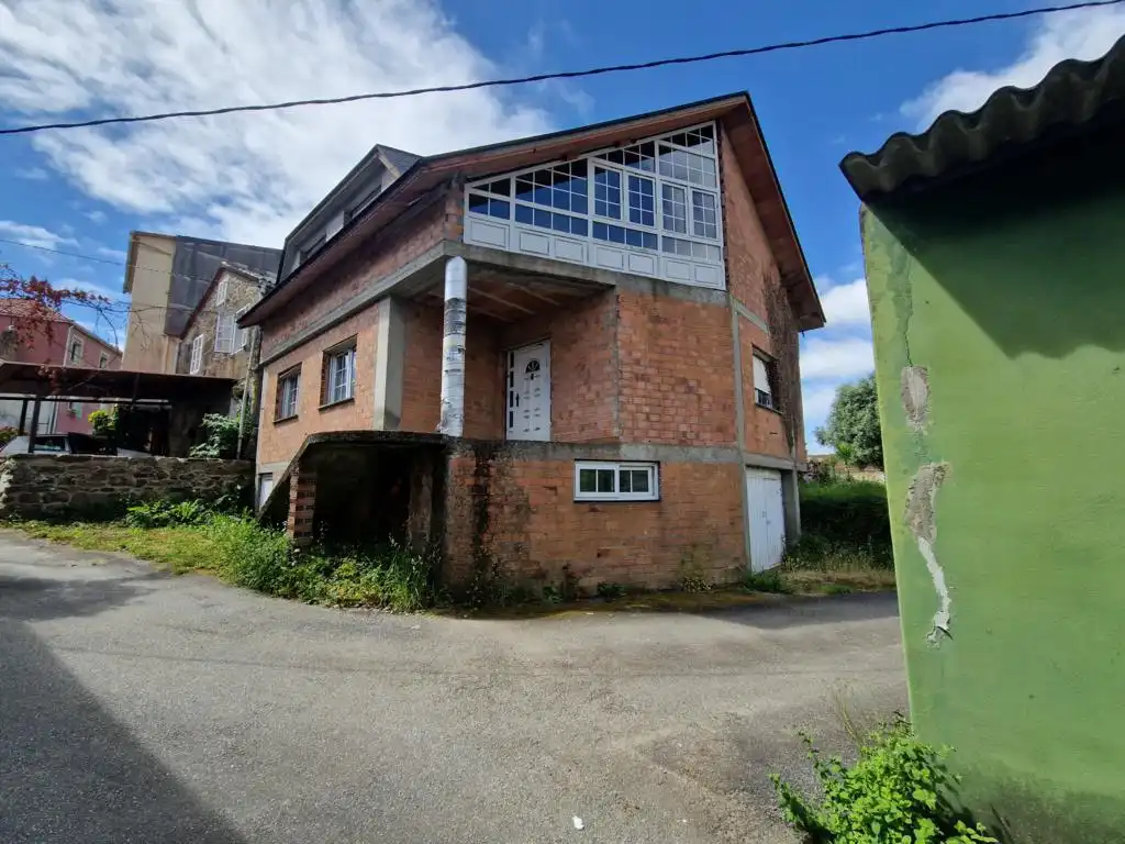 Vista exterior de Casa o xalet en venda en Rianxo amb Jardí privat, Traster i Balcó