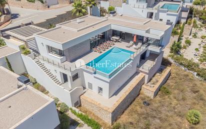 Exterior view of House or chalet for sale in Benitachell / El Poble Nou de Benitatxell  with Air Conditioner, Terrace and Swimming Pool