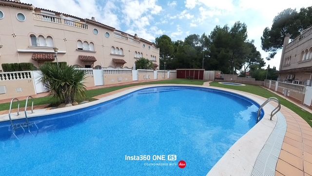 Swimming pool of Single-family semi-detached for sale in El Vendrell  with Air Conditioner, Heating and Terrace