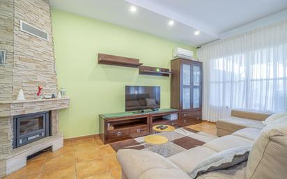 Living room of Single-family semi-detached for sale in Torroella de Fluvià  with Air Conditioner, Terrace and Balcony