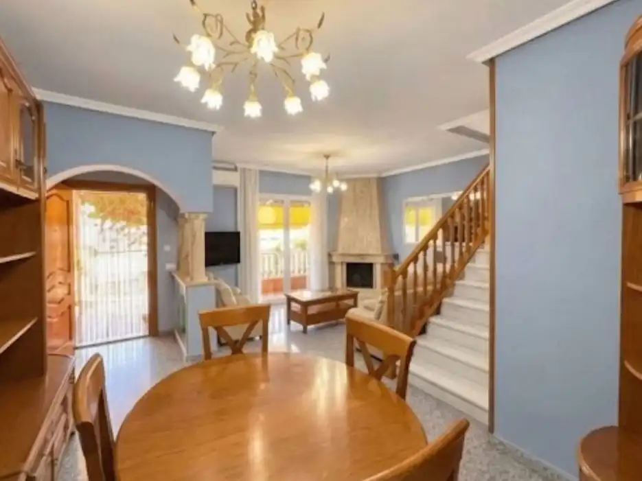 Sala de estar de Casa adosada en venta en Pulpí con Aire acondicionado, Terraza y Piscina