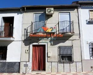 Exterior view of Single-family semi-detached for sale in Pinos Puente  with Air Conditioner, Terrace and Balcony