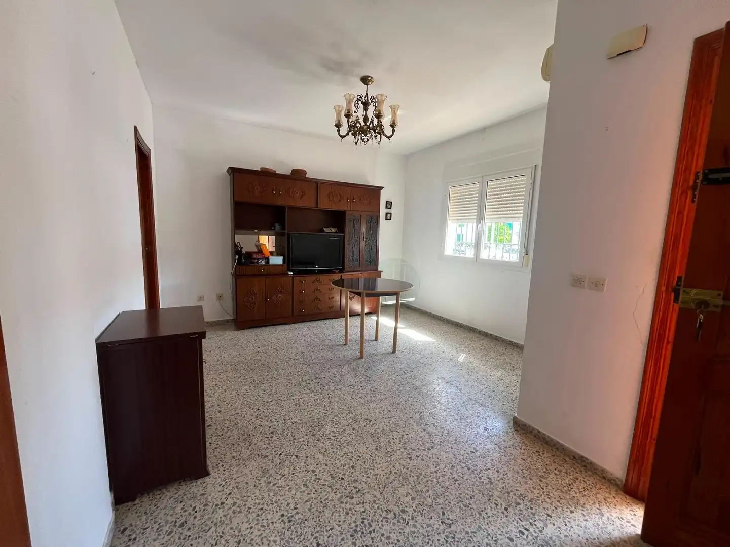 Sala de estar de Casa adosada en venta en Aznalcázar con Aire acondicionado