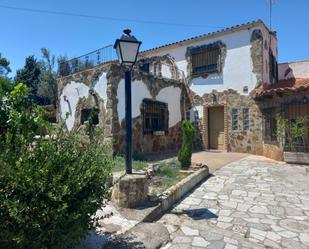 Exterior view of Single-family semi-detached for sale in El Viso de San Juan  with Air Conditioner, Terrace and Swimming Pool