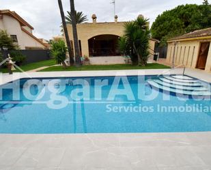 Piscina de Casa o xalet en venda en Sagunto / Sagunt amb Calefacció, Jardí privat i Terrassa