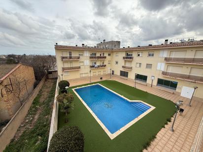 Swimming pool of Apartment for sale in L'Aldea  with Air Conditioner, Heating and Private garden