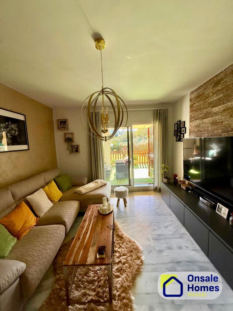 Living room of Planta baja for sale in Marbella  with Private garden, Storage room and Community pool