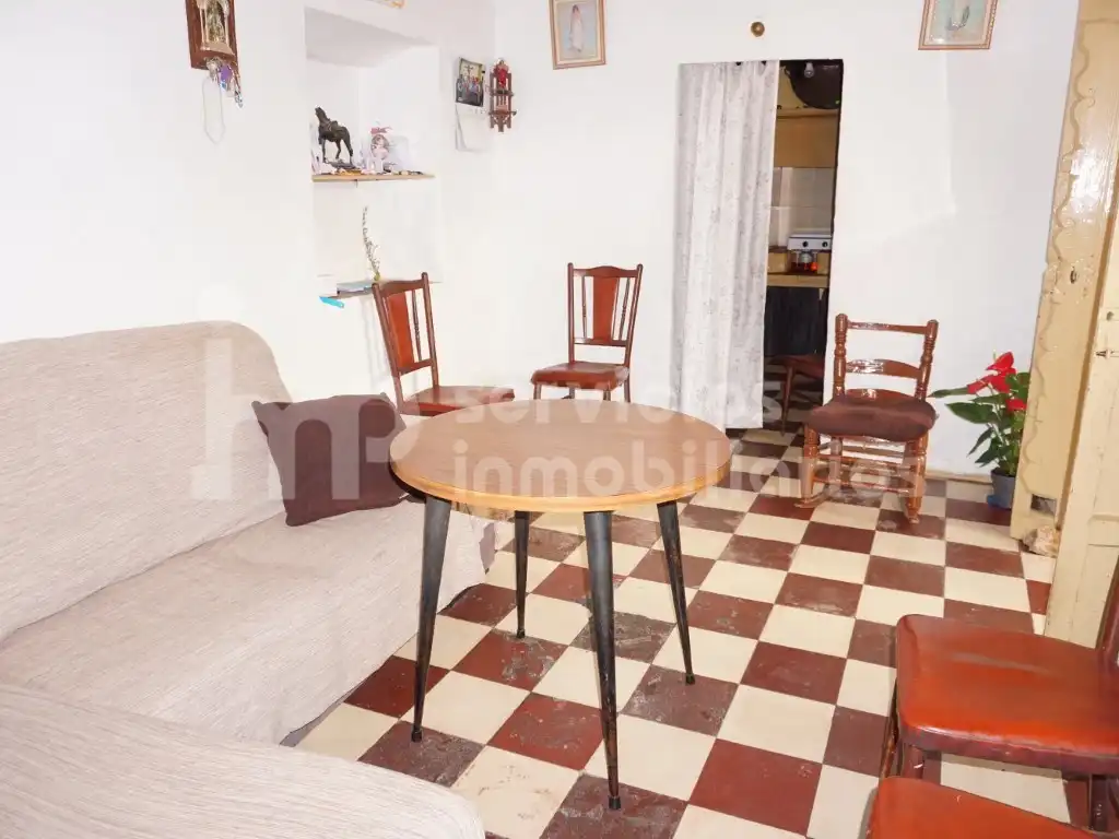 Sala de estar de Casa adosada en venta en Benamocarra con Jardín privado, Terraza y Amueblado