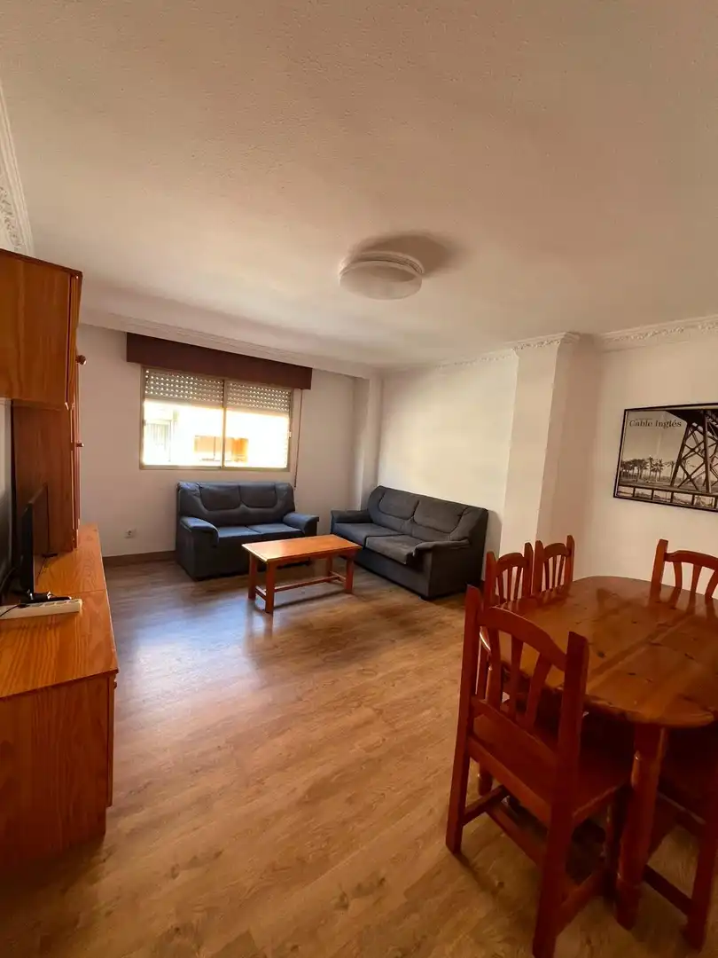 Sala d'estar de Apartament de lloguer en Almería amb Aire condicionat i Moblat