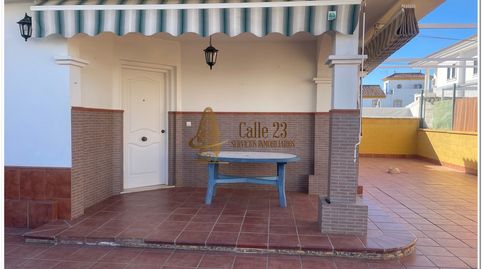 Casa Adosada en El Portil  ubicada en Urbanización Aldeas Fuentepiña- ¡Tu Refugio Junto al Mar!