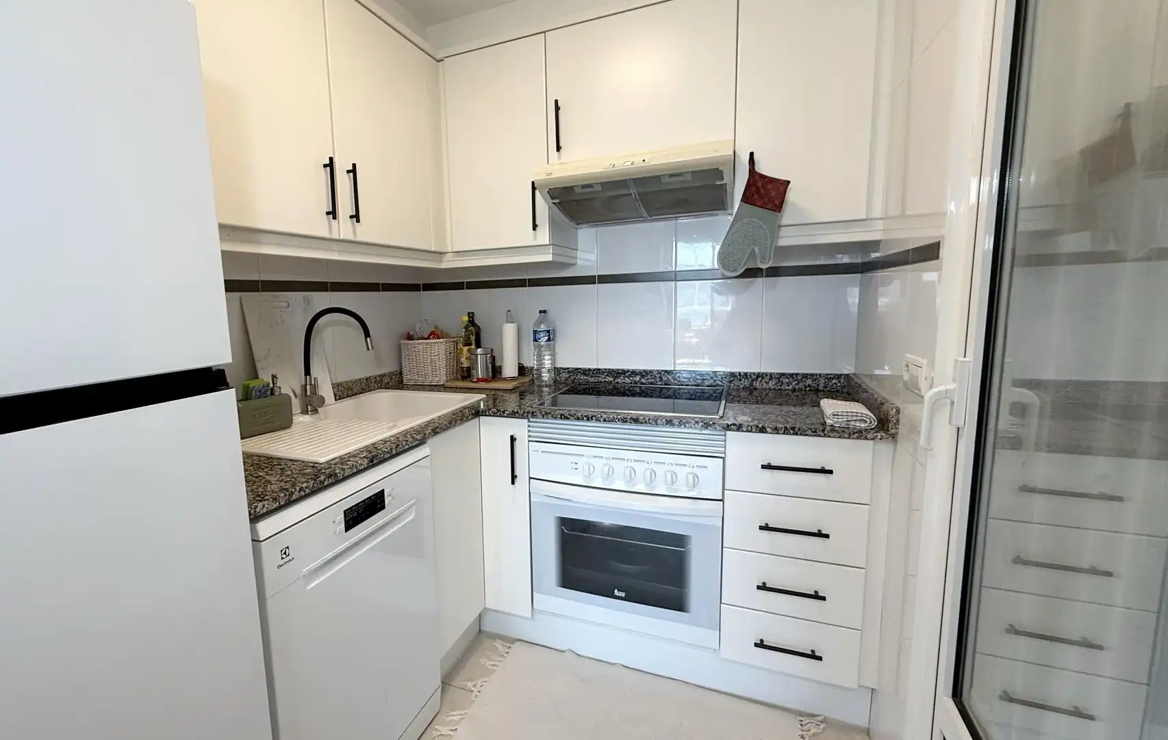 Cuina de Apartament en venda en Calpe / Calp amb Aire condicionat, Calefacció i Jardí privat