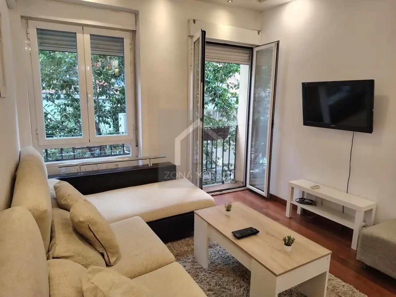 Sala de estar de Piso en venta en  Madrid Capital con Aire acondicionado y Balcón