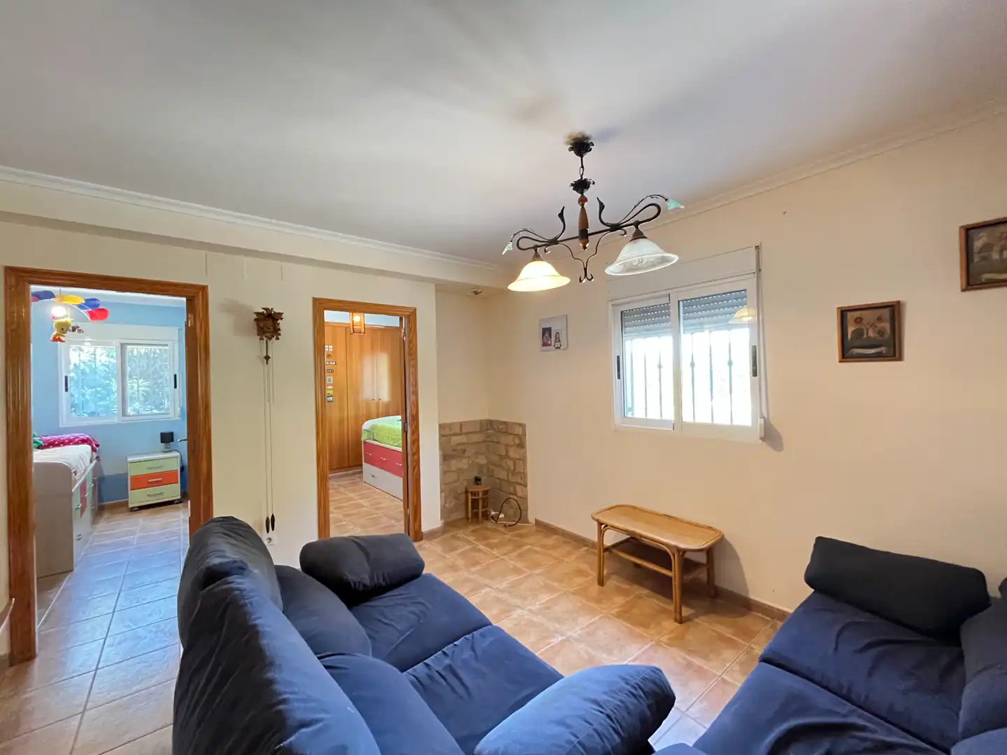 Sala d'estar de Casa o xalet en venda en Sagunto / Sagunt amb Aire condicionat, Calefacció i Jardí privat