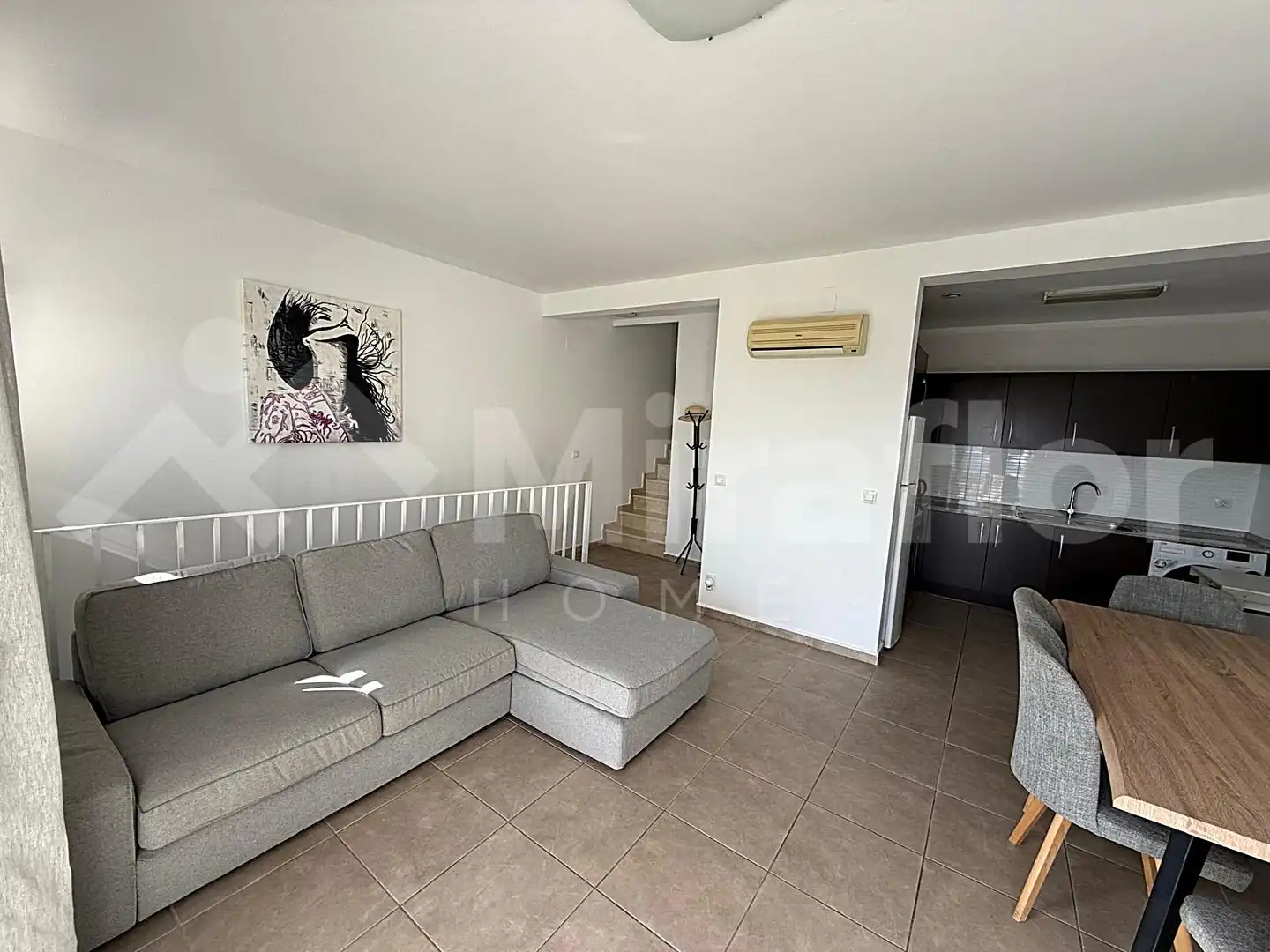 Sala d'estar de Casa adosada en venda en Pedreguer amb Aire condicionat, Terrassa i Moblat