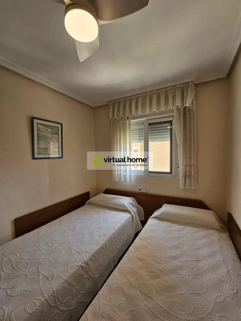 Bedroom of Flat for sale in Benidorm  with Air Conditioner, Terrace and Furnished