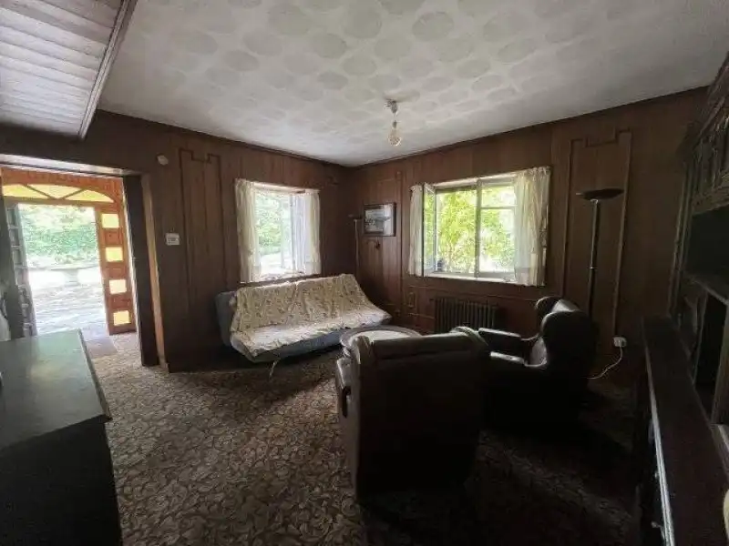 Sala d'estar de Casa o xalet en venda en Riotuerto amb Calefacció i Jardí privat