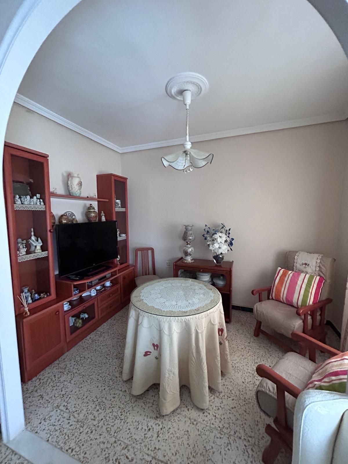 Sala d'estar de Casa o xalet en venda en Utrera amb Traster