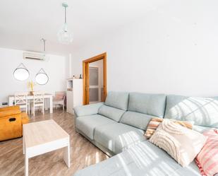 Sala d'estar de Casa adosada en venda en Huércal de Almería amb Aire condicionat i Terrassa