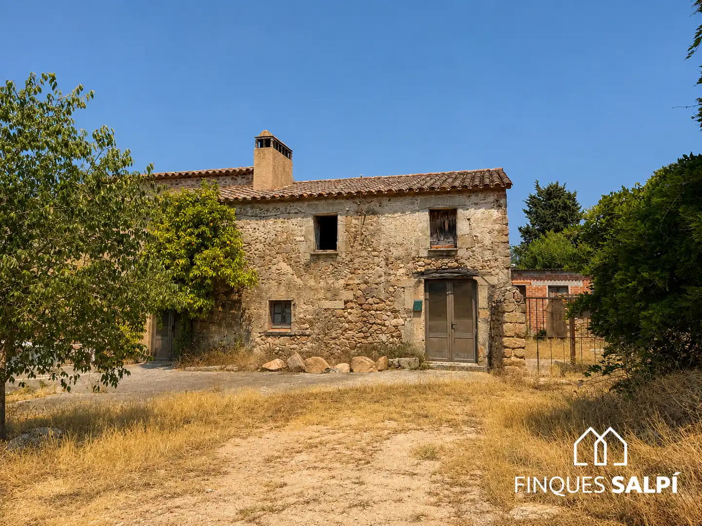 Vista exterior de Finca rústica en venda en Santa Cristina d'Aro amb Jardí privat