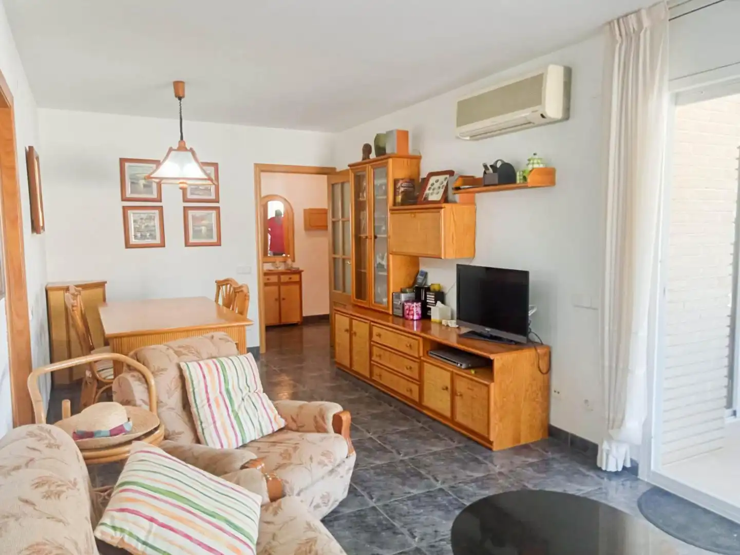 Living room of Flat for sale in Cunit  with Air Conditioner, Terrace and Community pool