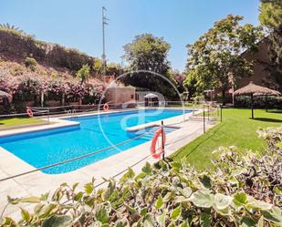 Swimming pool of Flat for sale in La Moraleja  with Air Conditioner, Heating and Private garden