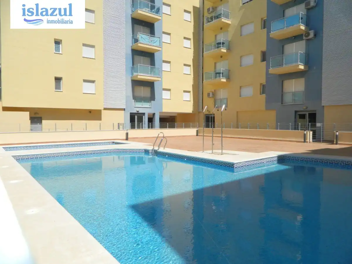 Piscina de Apartamento de alquiler en Isla Cristina con Aire acondicionado, Jardín privado y Terraza