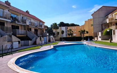 Swimming pool of Duplex for sale in Cambrils  with Air Conditioner, Terrace and Furnished