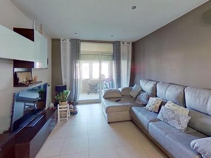 Sala d'estar de Casa adosada en venda en Golmés amb Aire condicionat, Calefacció i Jardí privat