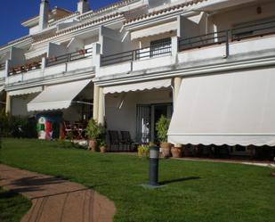 Jardí de Casa adosada de lloguer en El Portil amb Calefacció i Moblat