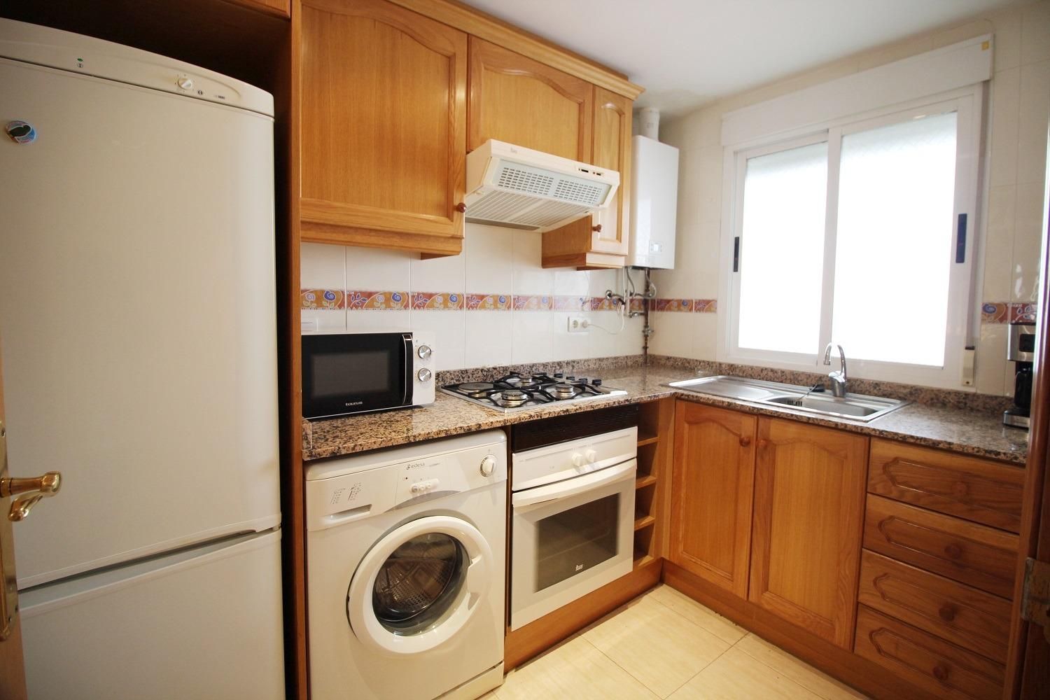 Kitchen of Apartment for sale in Oropesa del Mar / Orpesa  with Air Conditioner, Private garden and Terrace