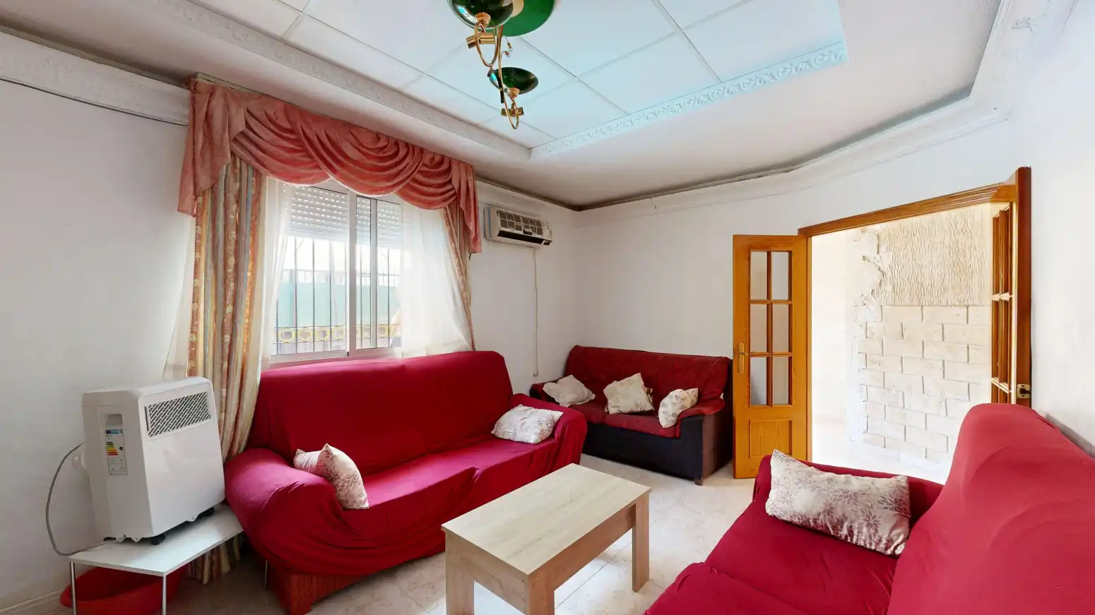 Sala d'estar de Casa adosada en venda en Cartagena amb Aire condicionat i Jardí privat