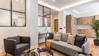 Living room of Flat for sale in  Madrid Capital  with Air Conditioner, Heating and Furnished