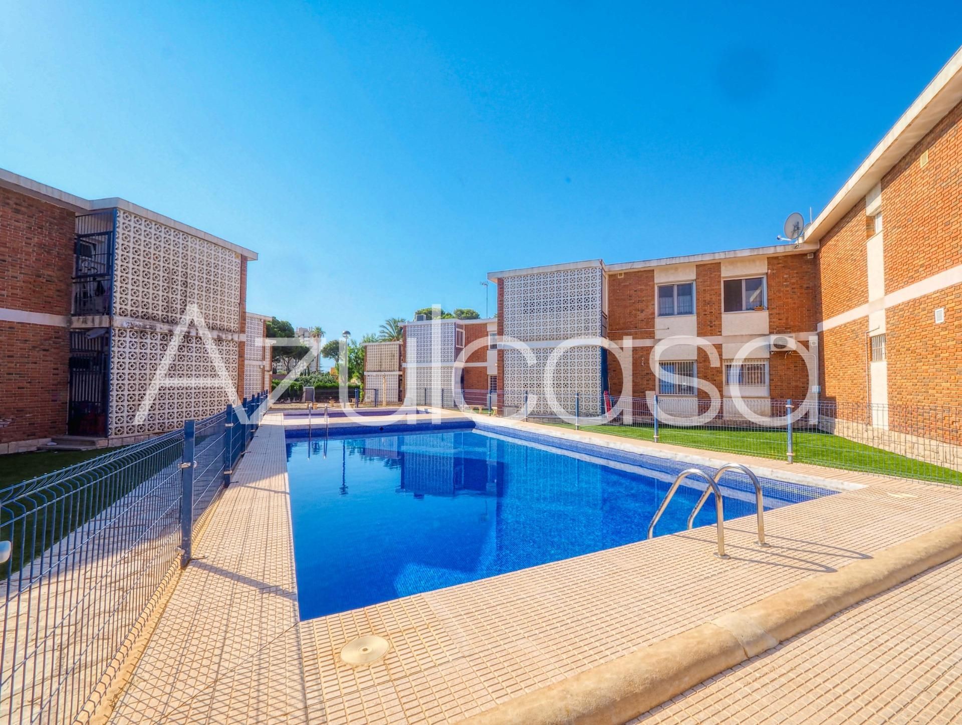 Swimming pool of Flat for sale in El Campello  with Air Conditioner, Terrace and Alarm