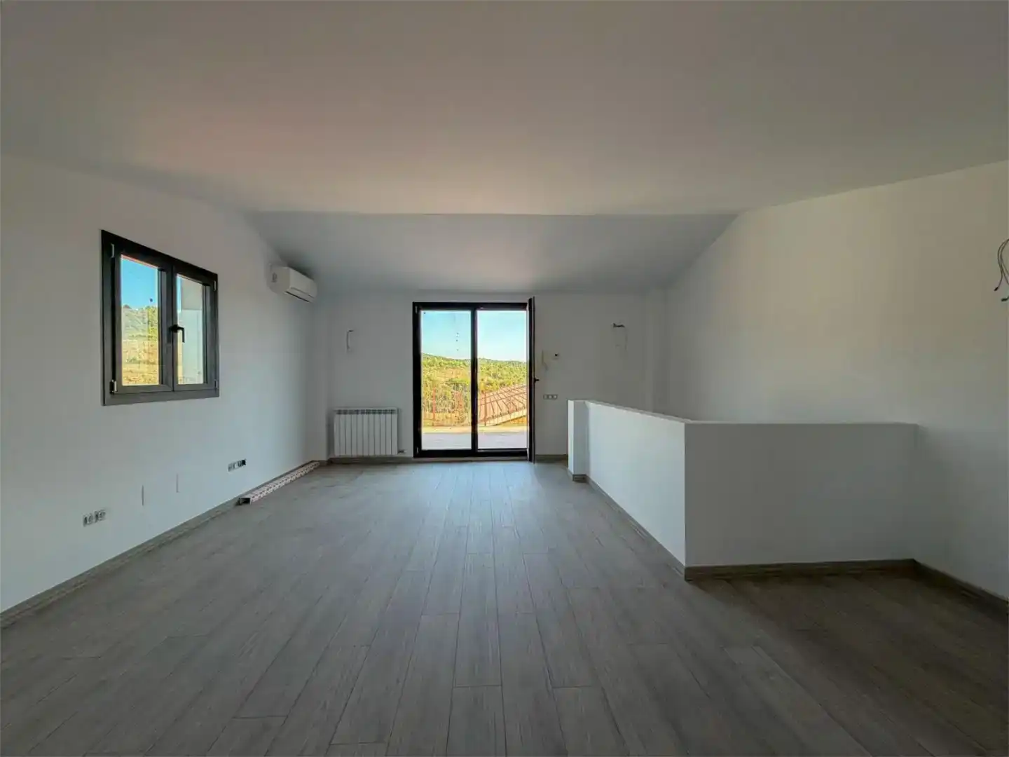 Sala d'estar de Casa adosada en venda en Puig-reig amb Aire condicionat i Balcó