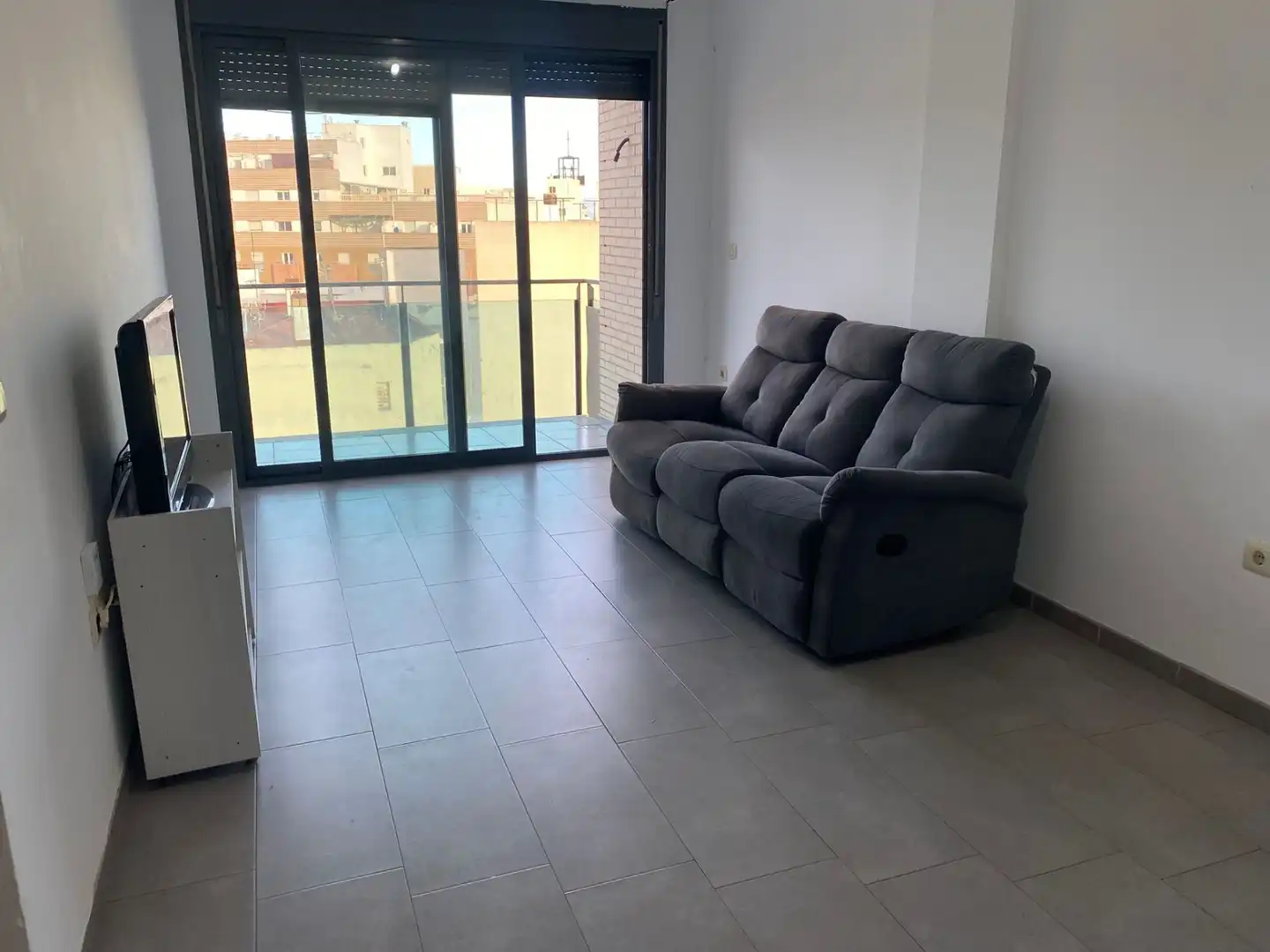 Living room of Flat for sale in Roquetas de Mar