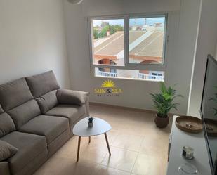 Dormitori de Apartament de lloguer en Los Alcázares amb Aire condicionat