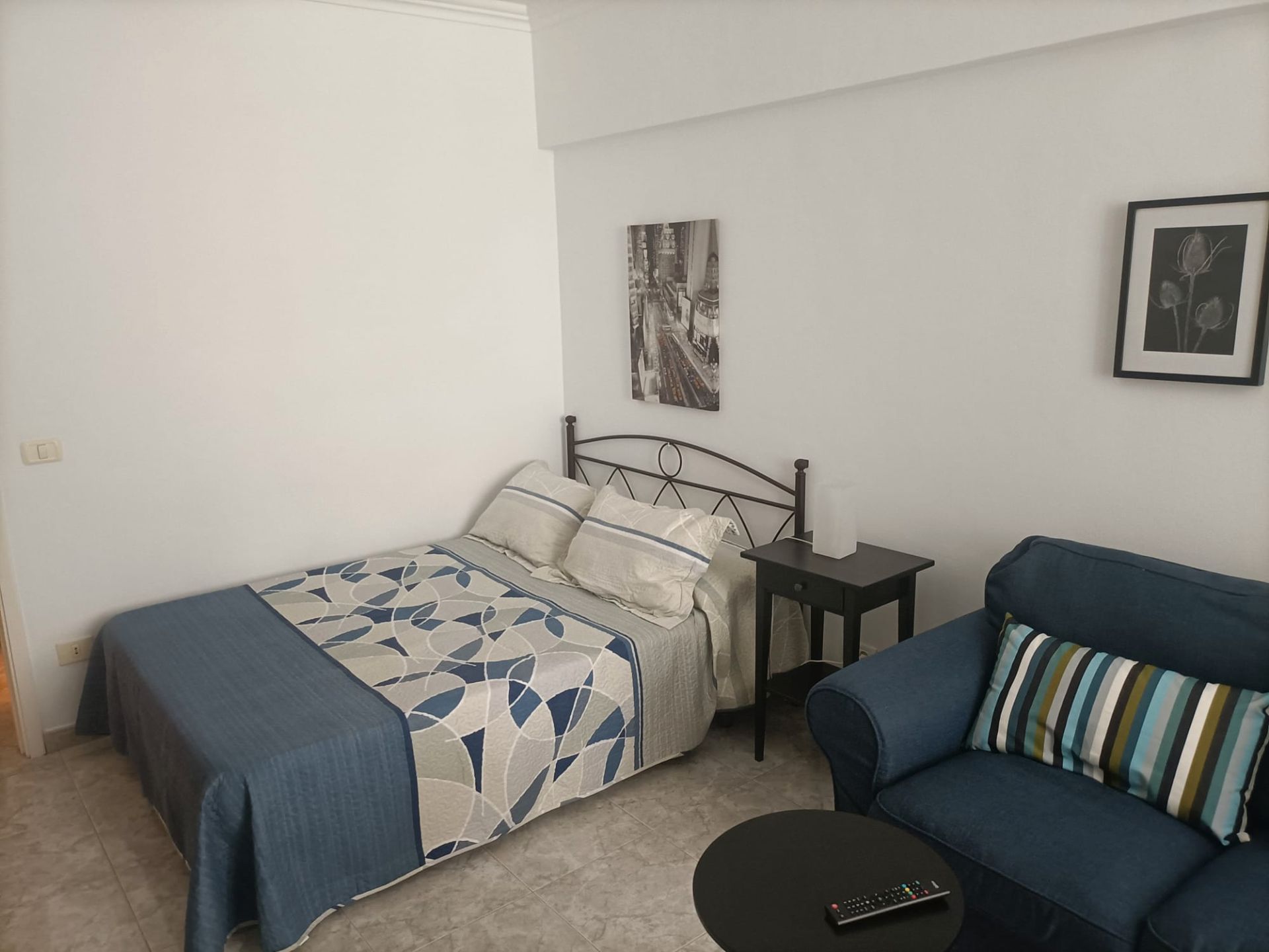 Dormitori de Apartament de lloguer en Puerto de la Cruz amb Moblat, Microones i TV