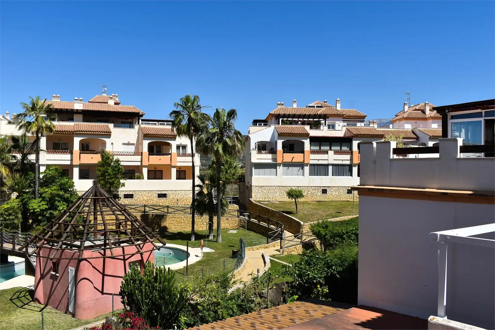 Jardín de Planta baja en venta en Vélez-Málaga con Aire acondicionado, Terraza y Piscina comunitaria